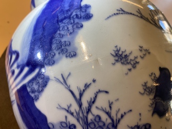 A Chinese blue and white jar and cover with figures in a landscape, Transitional period